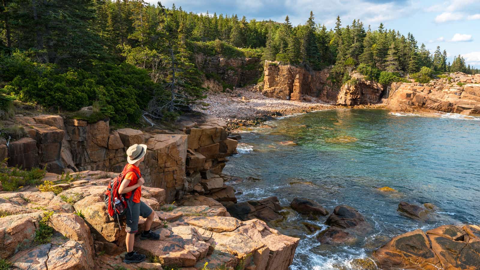 hiker taking in the views in Acadia National Park
